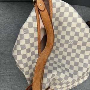 Luis Vuitton delightful monogram bag